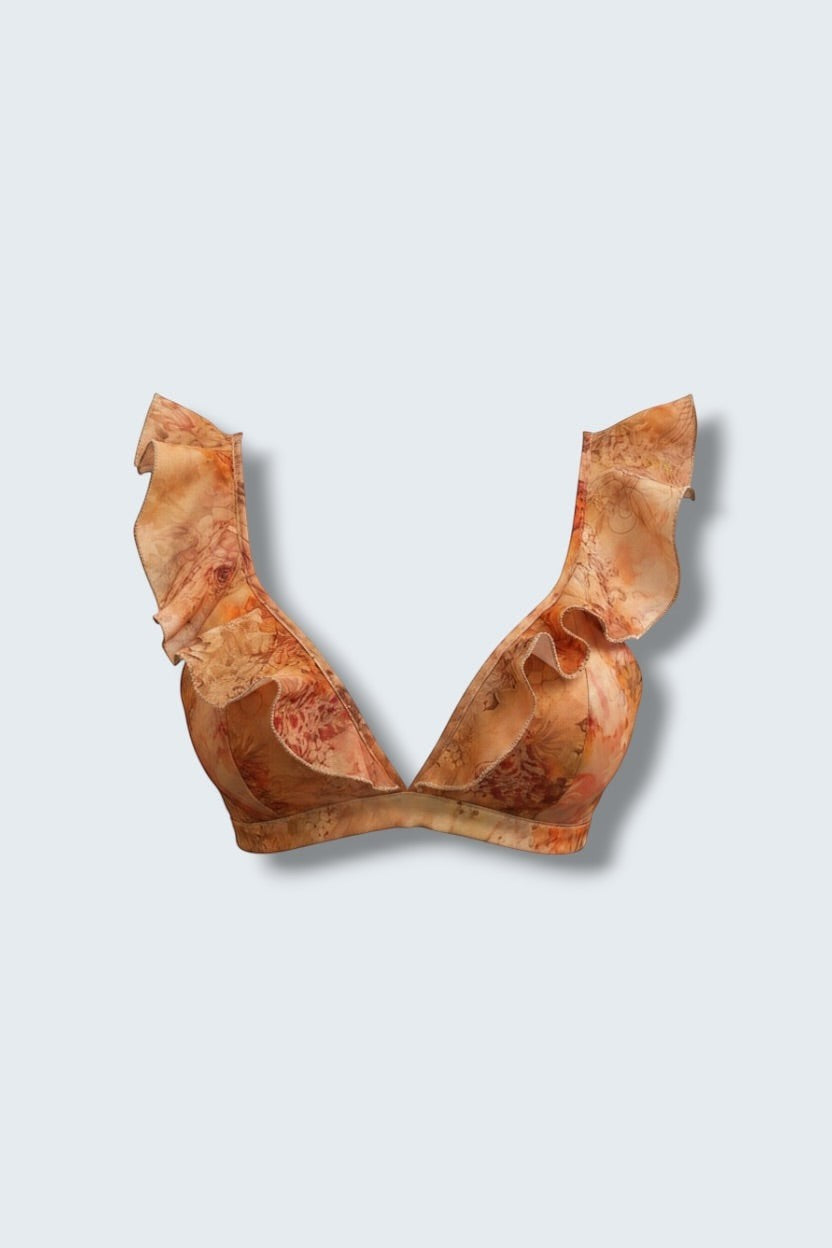 The Saint 54 Sunset bikini top in orange floral print with statement ruffle details and picot edge finish.