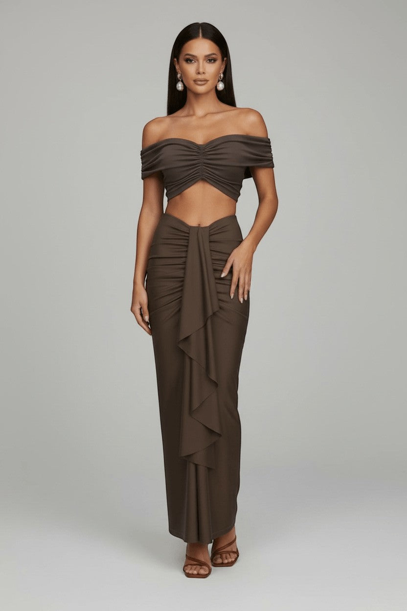 The Saint 54 brown ruched off-shoulder crop top and draped maxi skirt set